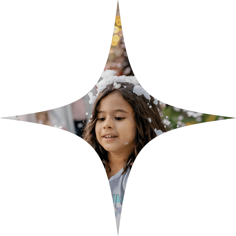 A small girl enjoys The Holiday Promenade on Water Street